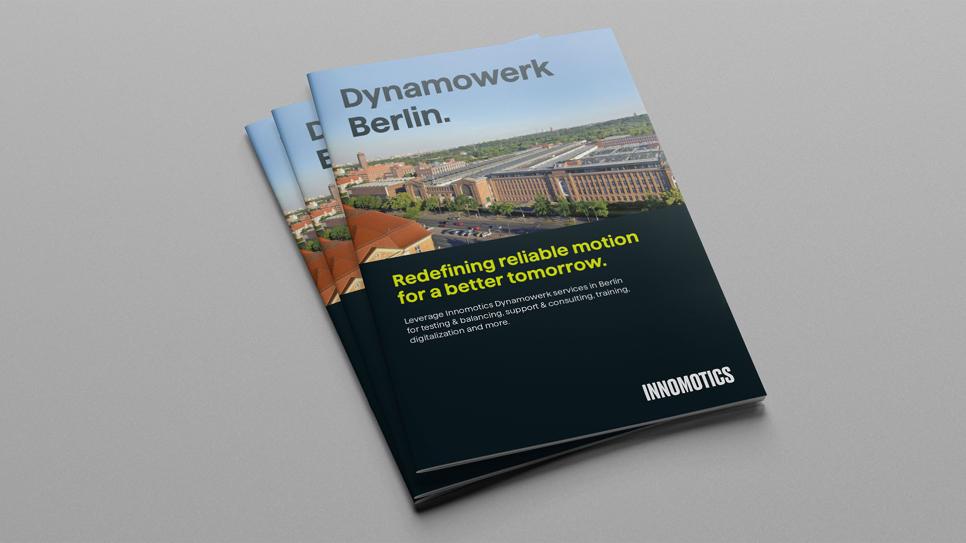 Mehrere Innomotics-Broschüren des Dynamowerks Berlin mit dem Titel ‚Redefining reliable motion for a better tomorrow‘.